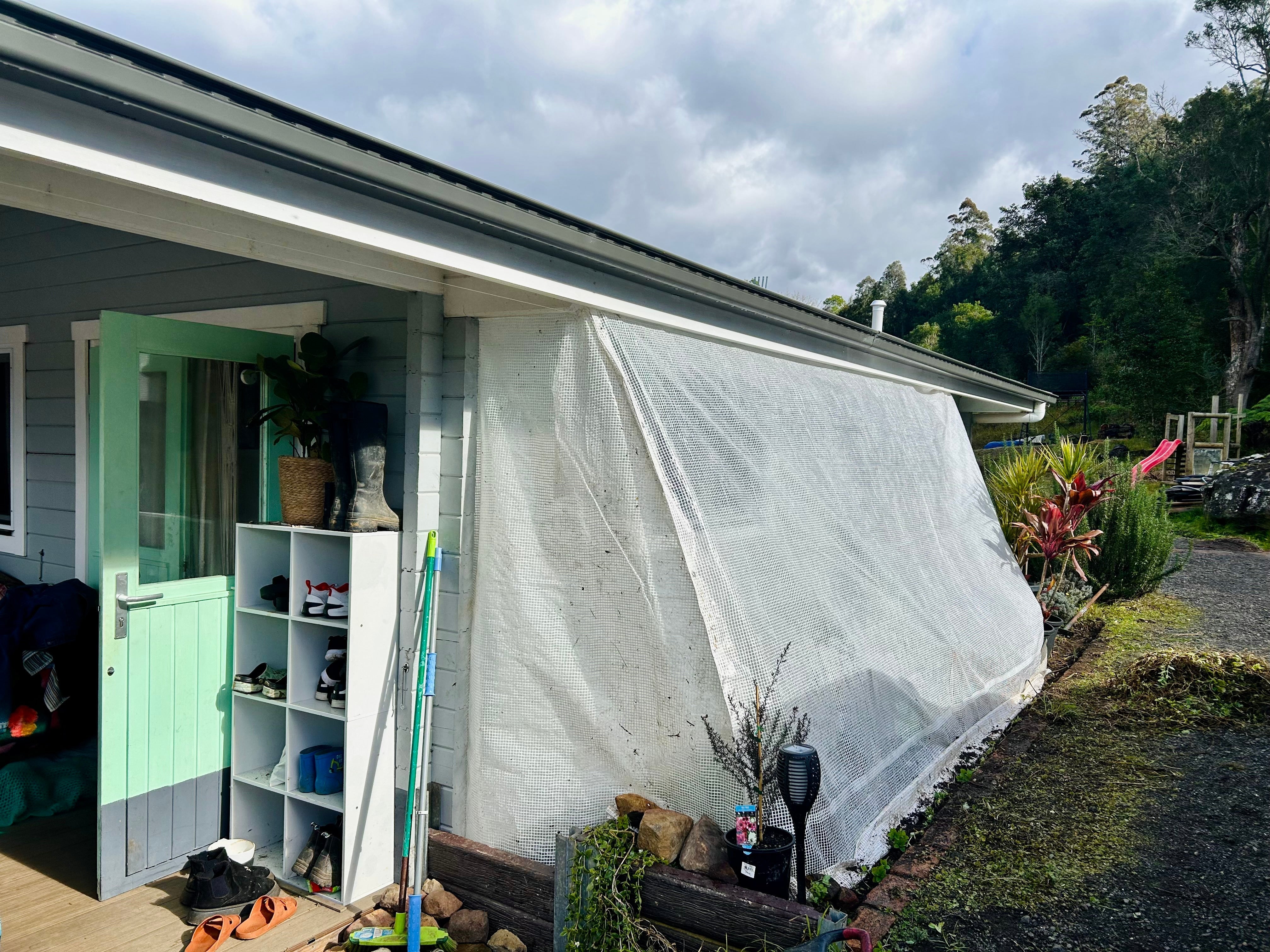 Small and Slow Solutions: How a Simple Tarp Turned My Coldest Spot into a Passive Heater